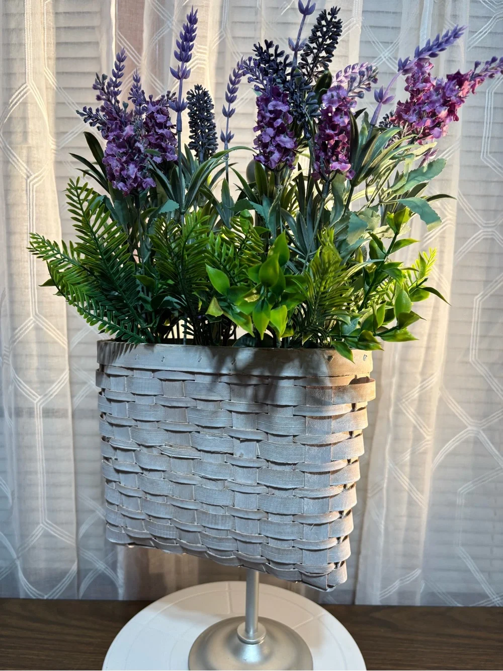 Decorative Lavender and Green Faux Floral Arrangement in White Woven Planter 18”